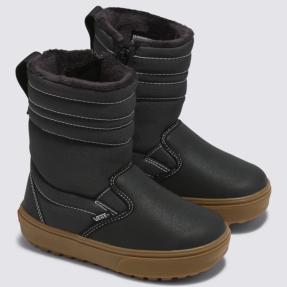 New with tags. Vans on snow boot.  Size 5